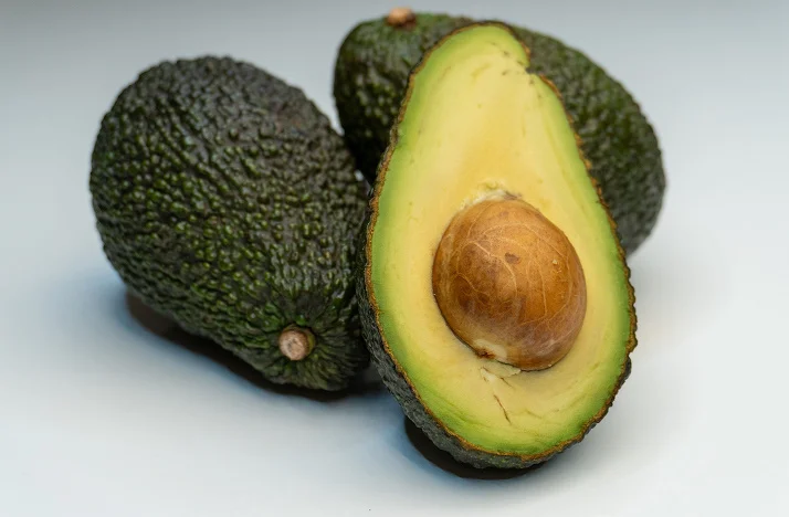 Funny avocado puns collection with avocados, guacamole, avocado toast, and humorous food-themed wordplay.