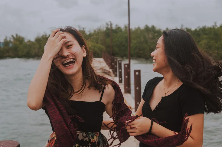 Best friends smiling together, sharing laughter and creating unforgettable memories during a fun day out, celebrating friendship, trust, and lifelong connection.